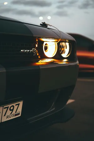 Dodge Challenger S R T Headlightat Dusk Wallpaper