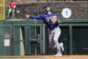 Dodgers Player Throwing Baseball Wallpaper