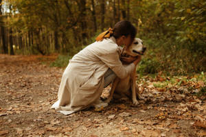 Dog And Girl Enjoying The Place Wallpaper