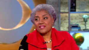 Donna Brazile Delivering Her Engaging Public Speech Wallpaper