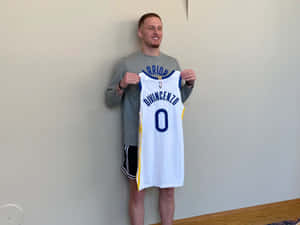 Donte Di Vincenzo Holding Warriors Jersey Wallpaper