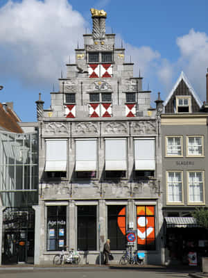 Dordrecht Historic Facadewith Golden Top Wallpaper