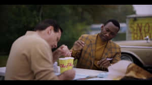 Dr. Don Shirley And Tony Lip In A Scene From Green Book Wallpaper