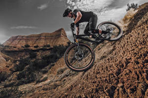 Dramatic 4k Mountain Bike Ride Wallpaper