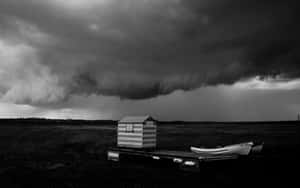 Dramatic Black And White Storm Clouds Wallpaper