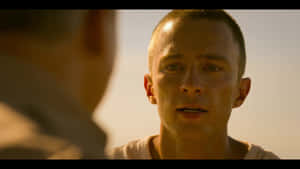 Drew Starkey Intense Movie Scene Wallpaper