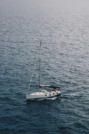 Drifting Speed Boat On Vast Ocean Wallpaper