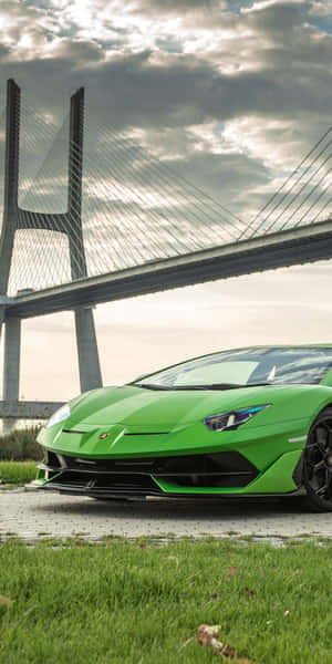 Drive In Style With A Green Lamborghini Iphone Wallpaper