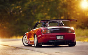 Driving Fun In A Honda S2000 Convertible Wallpaper