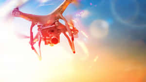 Drone In Flight Sunset Sky Wallpaper