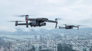 Drones Over Cityscape Wallpaper