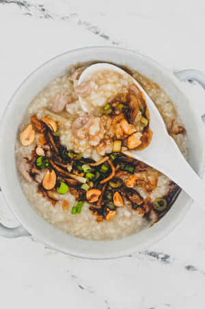 Duck Rice Congee Overhead Angle Shot Wallpaper