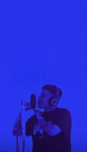 Duki Blue Background Singing Wallpaper