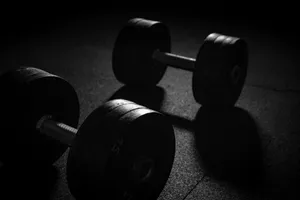Dumbbells Used For Strength Training Wallpaper