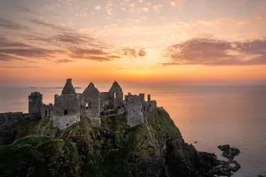 Dunluce Castle Ruin Northern Ireland Sunset Horizon Wallpaper