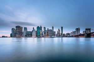 Dusk City Skyline Waterfront View.jpg Wallpaper