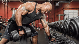 Dwayne Johnson Dumbbell Workout Wallpaper