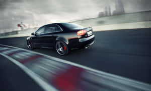 Dynamic And Powerful Audi S4 In Action Wallpaper