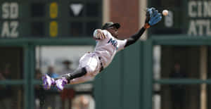 Dynamic_ Baseball_ Catch_ Action.jpg Wallpaper