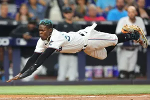 Dynamic Baseball Dive Catch Wallpaper