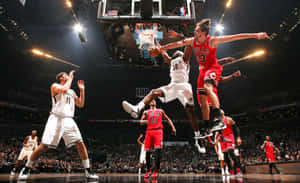 Dynamic Basketball Game Action Wallpaper