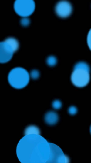 Dynamic Black Blue Bokeh Wallpaper