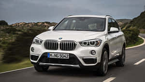 Dynamic Bmw X1 On The Road Wallpaper