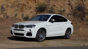 Dynamic Bmw X4 In Motion Wallpaper