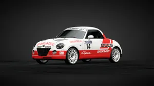 Dynamic Daihatsu Copen Gliding On The Road Wallpaper