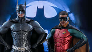 Dynamic Duo: Batman And Robin In Action Wallpaper