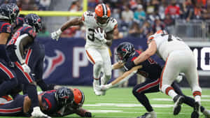 Dynamic Football Action Jerome Ford Wallpaper