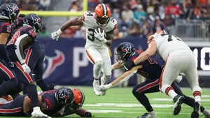 Dynamic Football Action Jerome Ford Wallpaper