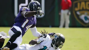 Dynamic Football Action Tackle Wallpaper