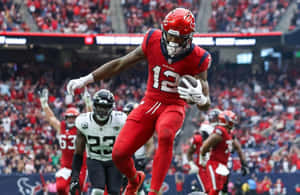 Dynamic Football Catch Moment Wallpaper