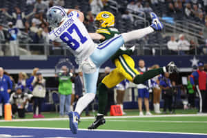 Dynamic Football Catch Moment Wallpaper