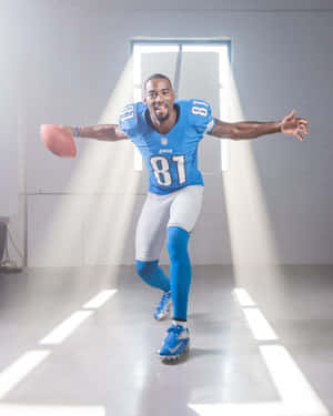 Dynamic Football Catch Pose Calvin Johnson Wallpaper