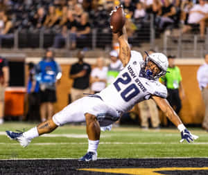 Dynamic Football Catch Utah State Player20 Wallpaper