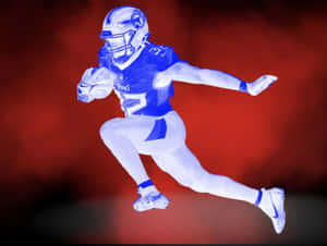 Dynamic Football Player Action Pose Wallpaper