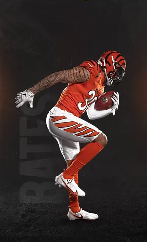 Dynamic Football Player Action Pose Wallpaper