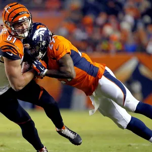 Dynamic Football Tackle Action Wallpaper