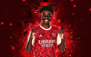 Dynamic Footballer Red Background Wallpaper