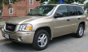 Dynamic Gmc Envoy On The Road Wallpaper