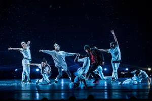 Dynamic_ Hip Hop_ Dance_ Performance_ Under_ Spotlights Wallpaper