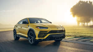 Dynamic Lamborghini Urus On The Race Track Wallpaper