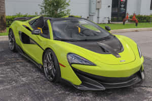 Dynamic Mclaren 600lt Spider In Action Wallpaper