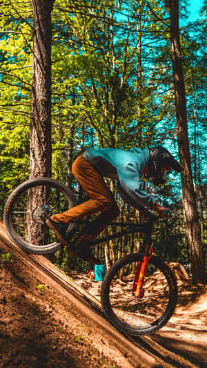 Dynamic Mountain Biking Trail Action.jpg Wallpaper