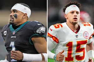 Dynamic Nfl Quarterback In Action Wallpaper