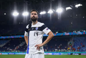 Dynamic Soccer Captain Leading The Team Wallpaper