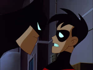 Dynamic Tim Drake In Action Wallpaper