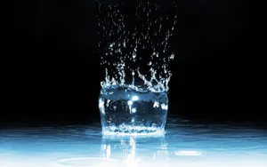 Dynamic Water Splashin Glass Wallpaper